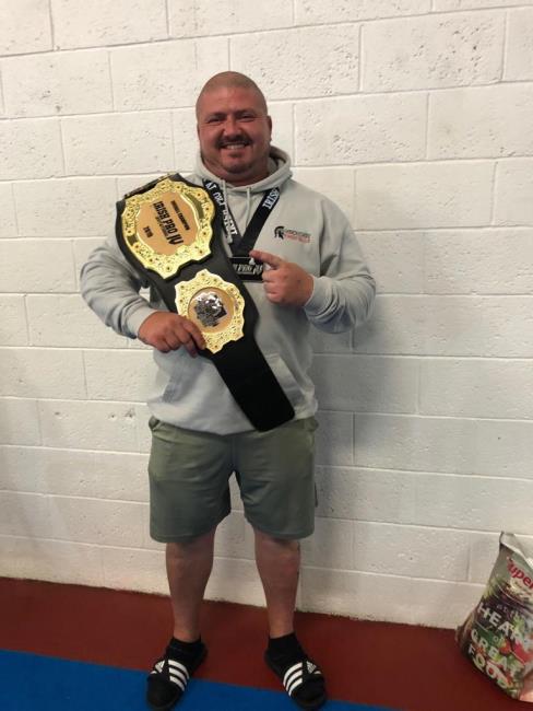 Aaron Hoskings with winning belt at Irish Pro Lifters competition